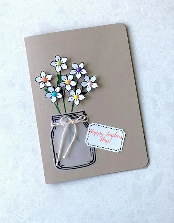 Mẫu thiệp 20/11 handmade có hình lọ hoa với hoa được cắt và dán khéo léo