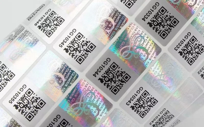 Mẫu tem chống hàng giả Hologram tích hợp QR code/serial Mẫu tem chống hàng giả Hologram tích hợp QR code/serial