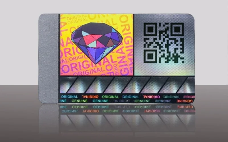 Mẫu tem chống hàng giả Hologram tích hợp QR code/serial Mẫu tem chống hàng giả Hologram tích hợp QR code/serial