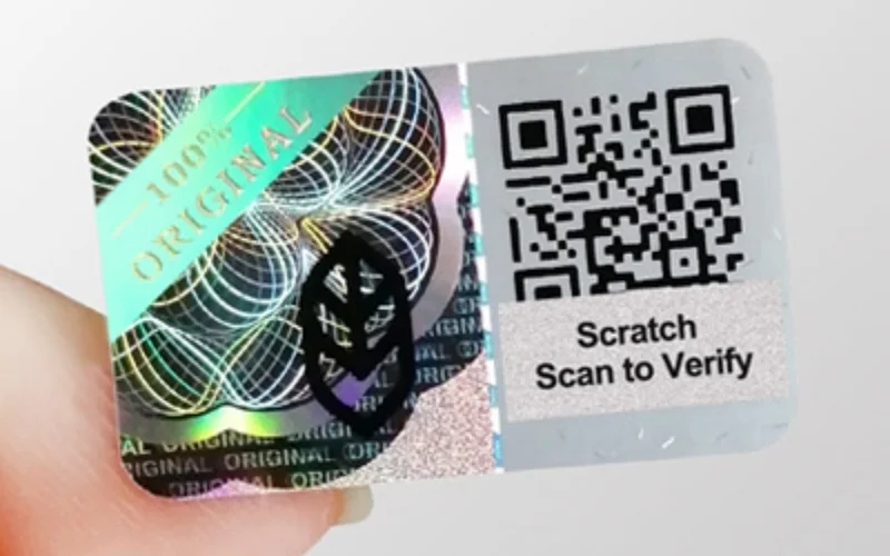 Mẫu tem chống hàng giả Hologram tích hợp QR code/serial Mẫu tem chống hàng giả Hologram tích hợp QR code/serial