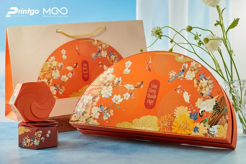 Hộp quà Tết màu cam – Nguồn năng lượng sáng tạo & nhiệt huyết bứt phá: hộp quà tết Vạn Thuỷ Thanh Ngư