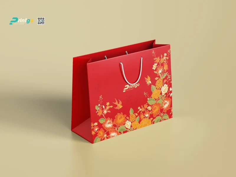 Túi giấy đựng quà tết màu đỏ do Printgo thiết kế và in ấn