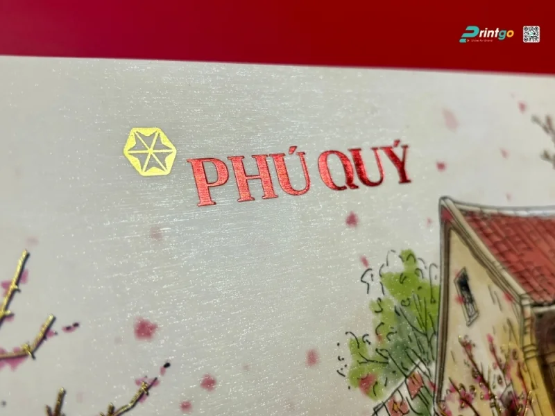 Ép kim, thúc nổi và UV định hình: Chọn gia công nào cho hộp quà Tết?