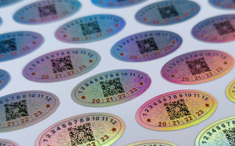 Mẫu tem chống hàng giả Hologram tích hợp QR code/serial Mẫu tem chống hàng giả Hologram tích hợp QR code/serial