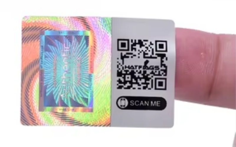 Mẫu tem chống hàng giả Hologram tích hợp QR code/serial Mẫu tem chống hàng giả Hologram tích hợp QR code/serial