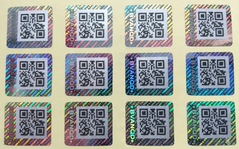 Mẫu tem chống hàng giả Hologram tích hợp QR code/serial Mẫu tem chống hàng giả Hologram tích hợp QR code/serial