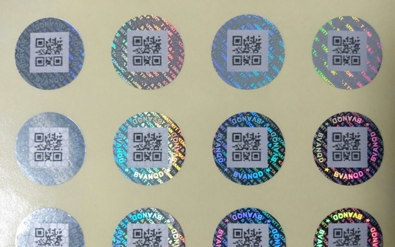 Mẫu tem chống hàng giả Hologram tích hợp QR code/serial Mẫu tem chống hàng giả Hologram tích hợp QR code/serial