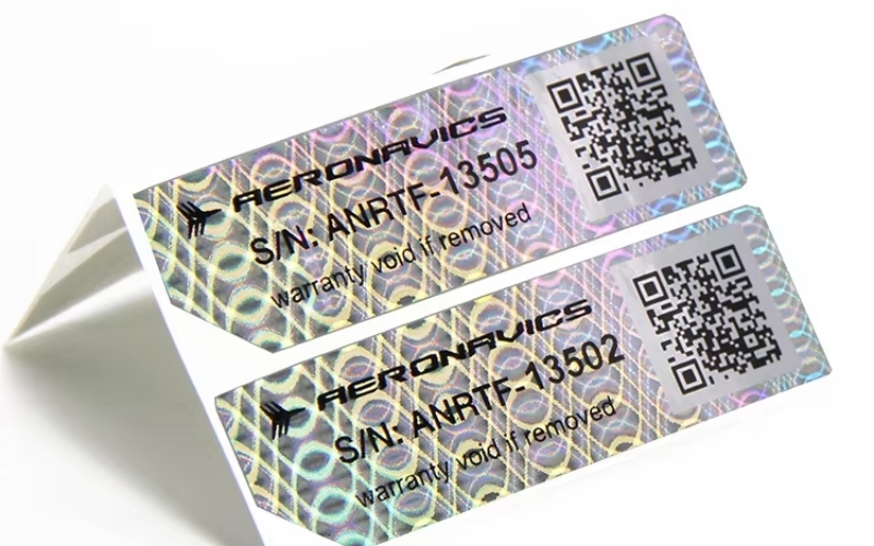 Mẫu tem chống hàng giả Hologram tích hợp QR code/serial Mẫu tem chống hàng giả Hologram tích hợp QR code/serial