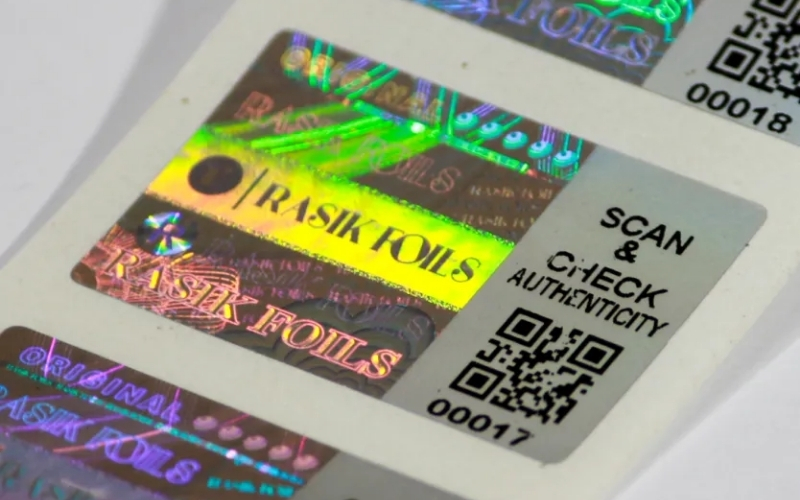 Mẫu tem chống hàng giả Hologram tích hợp QR code/serial Mẫu tem chống hàng giả Hologram tích hợp QR code/serial