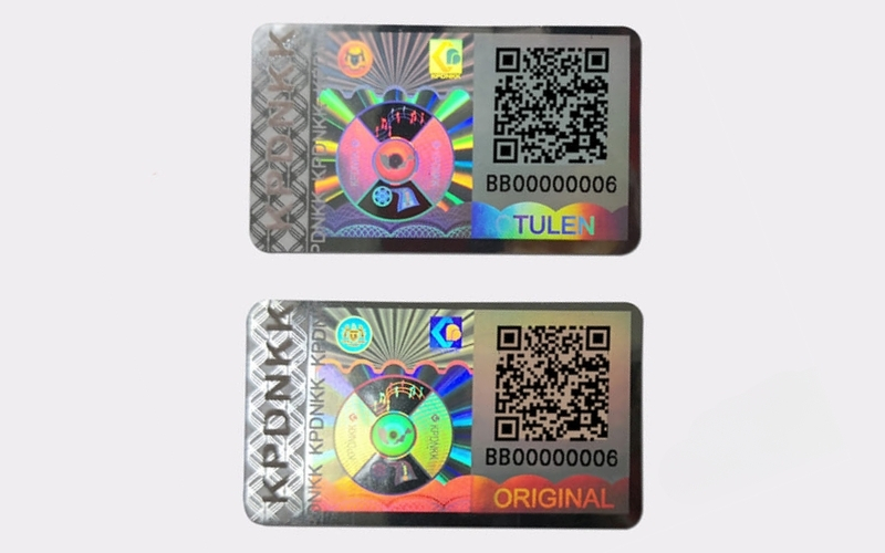 Mẫu tem chống hàng giả Hologram tích hợp QR code/serial Mẫu tem chống hàng giả Hologram tích hợp QR code/serial