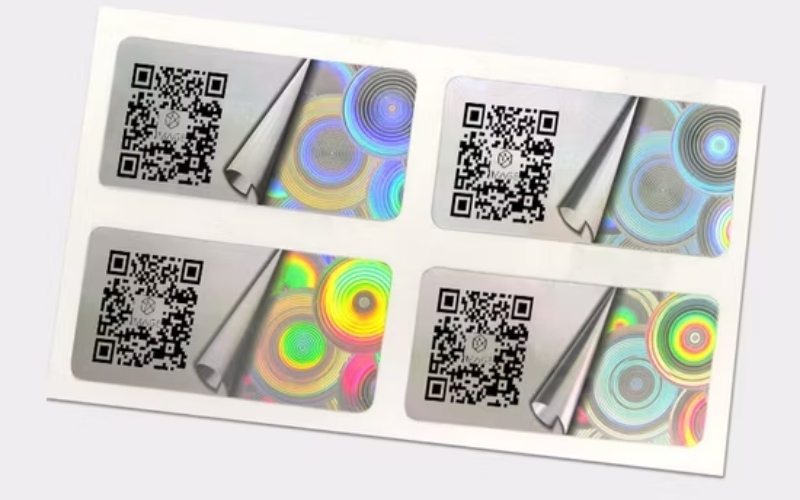 Mẫu tem chống hàng giả Hologram tích hợp QR code/serial Mẫu tem chống hàng giả Hologram tích hợp QR code/serial