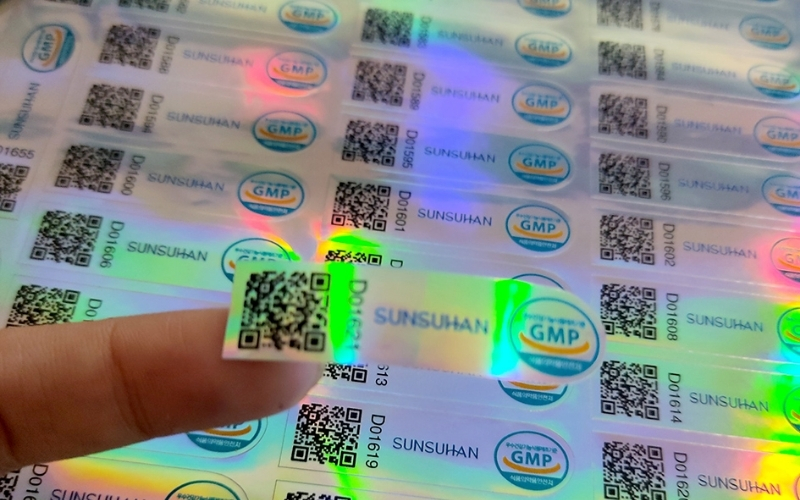 Mẫu tem chống hàng giả Hologram tích hợp QR code/serial Mẫu tem chống hàng giả Hologram tích hợp QR code/serial
