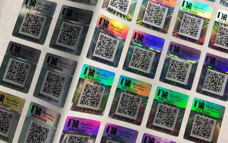 Mẫu tem chống hàng giả Hologram tích hợp QR code/serial Mẫu tem chống hàng giả Hologram tích hợp QR code/serial