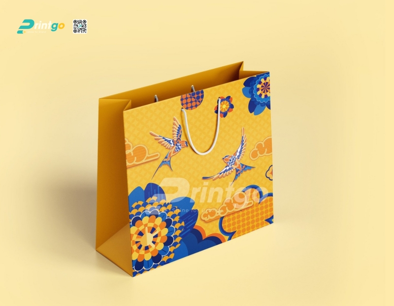Mẫu túi giấy đựng quà tết màu vàng do Printgo thiết kế và in ấn Mẫu túi giấy đựng quà tết màu vàng do Printgo thiết kế và in ấn